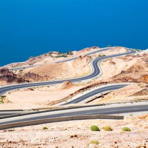 Dead &#039;s sea road area, curvy highway with desert landscape